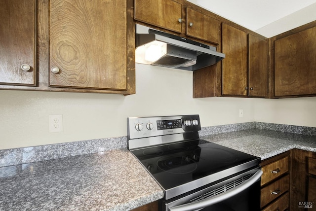 kitchen featuring stainless steel range with electric cooktop