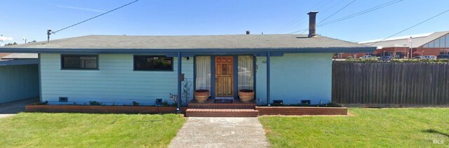 view of front facade with a front lawn