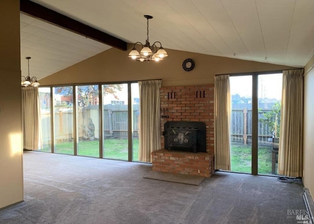 unfurnished living room with carpet flooring, vaulted ceiling with beams, and a notable chandelier