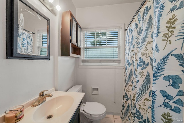 bathroom featuring tile patterned flooring, vanity, toilet, and a shower with curtain