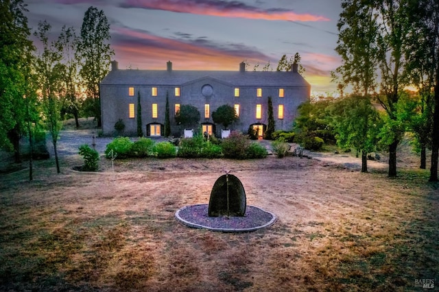 exterior space featuring a chimney