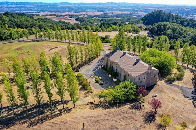 aerial view featuring a forest view