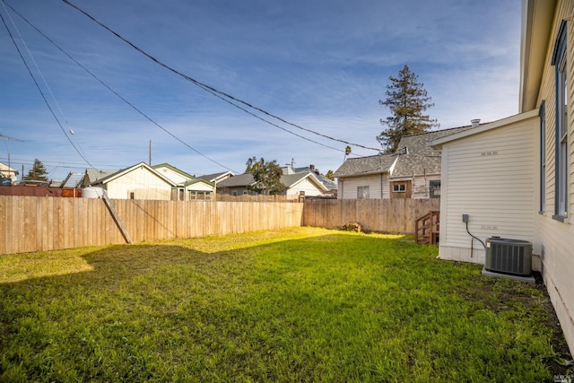 view of yard with central AC unit