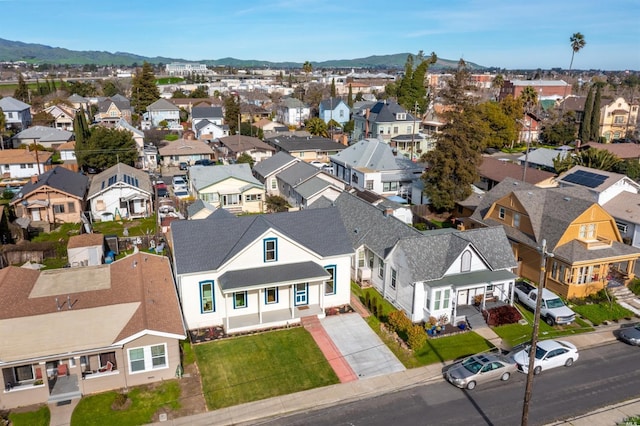 drone / aerial view featuring a mountain view