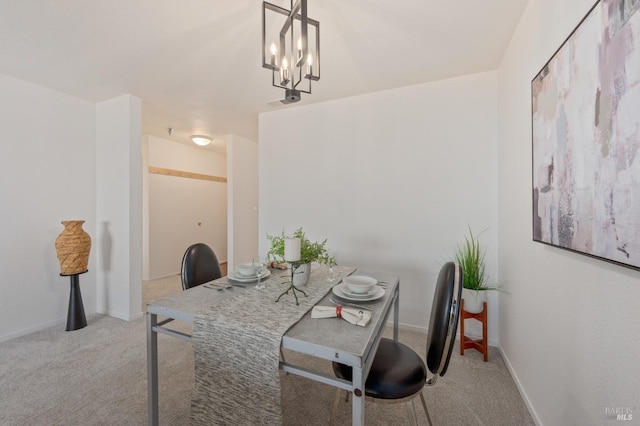 view of carpeted dining space