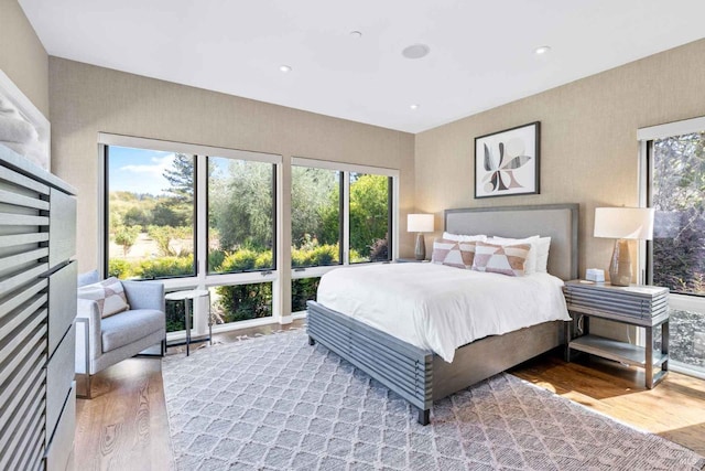 bedroom with hardwood / wood-style flooring