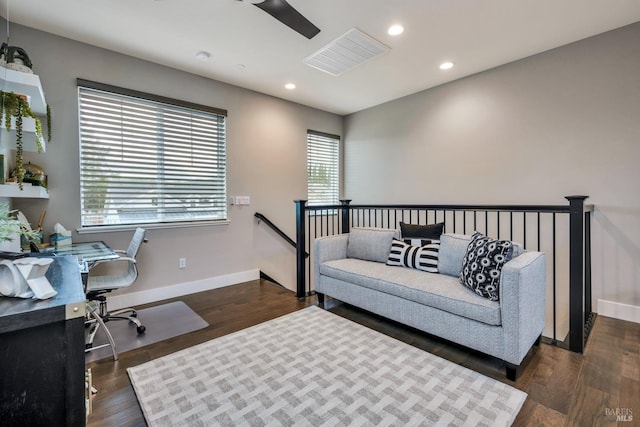 office space with dark hardwood / wood-style flooring