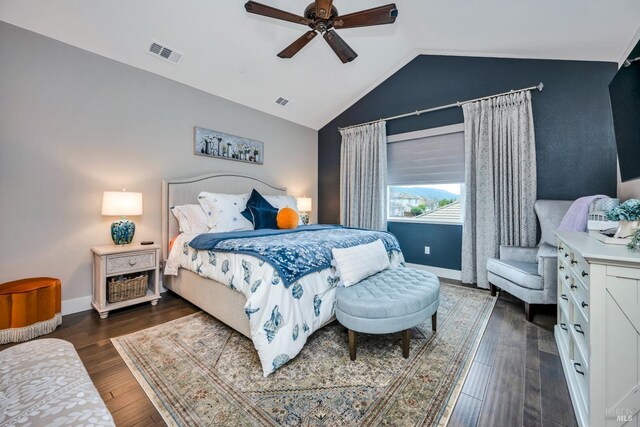 bedroom featuring lofted ceiling, ceiling fan, and dark hardwood / wood-style floors