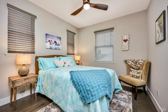 bedroom featuring ceiling fan and dark hardwood / wood-style flooring