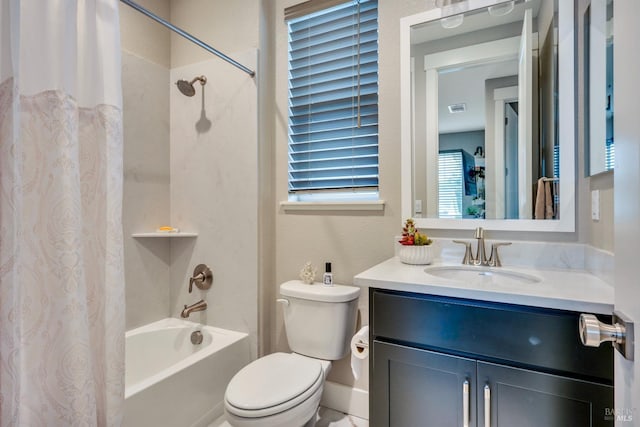 full bathroom featuring shower / tub combo, vanity, and toilet