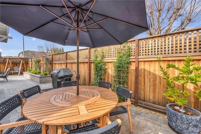 view of patio with area for grilling