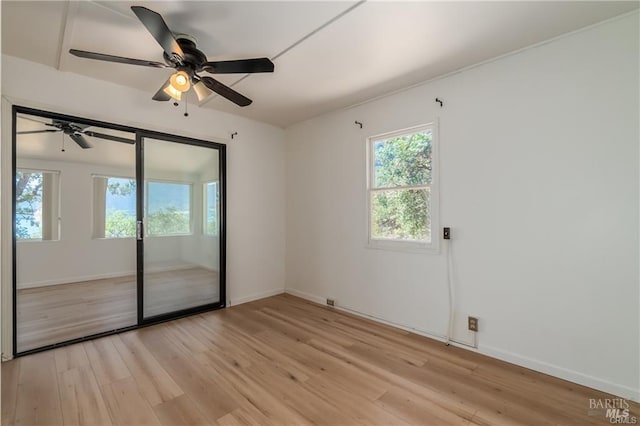 interior space with ceiling fan and light wood-type flooring