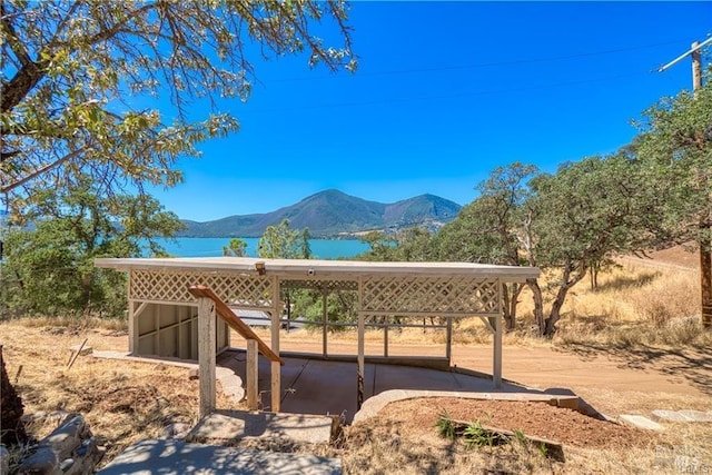 view of home's exterior with a mountain view