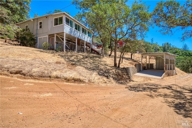 exterior space featuring a carport