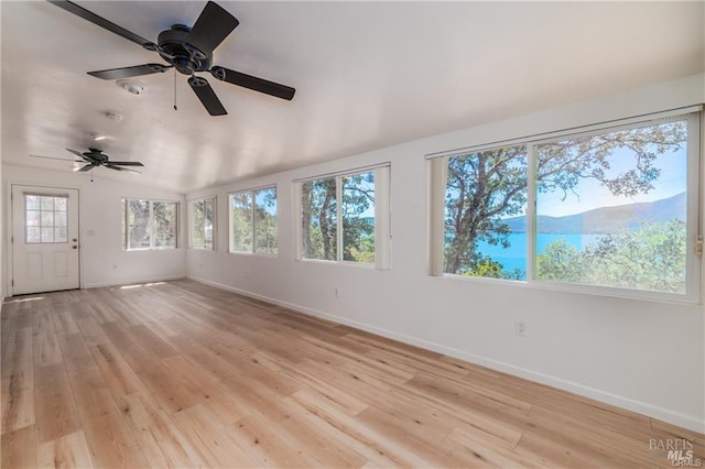 interior space featuring ceiling fan