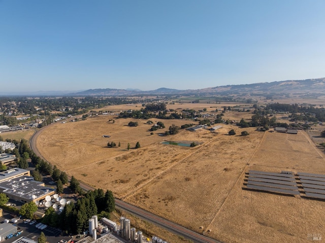 bird's eye view with a mountain view and a rural view