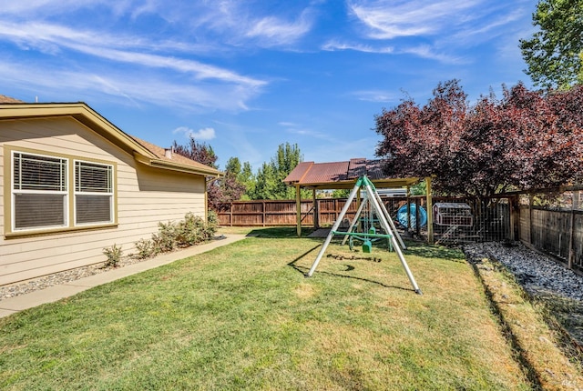 view of yard with a playground