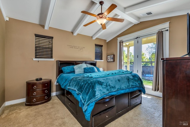 carpeted bedroom featuring access to outside, vaulted ceiling with beams, and ceiling fan