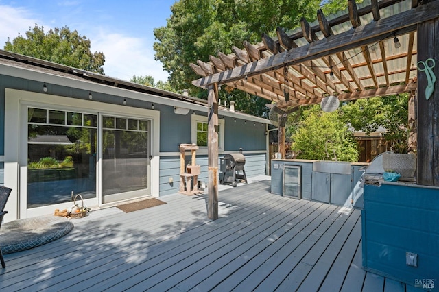 wooden terrace with a pergola