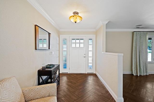 entryway featuring visible vents, baseboards, and ornamental molding