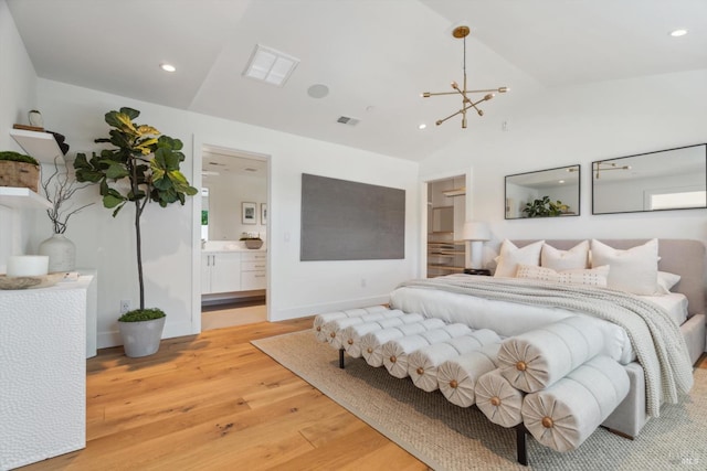 bedroom with baseboards, visible vents, vaulted ceiling, light wood-style floors, and recessed lighting