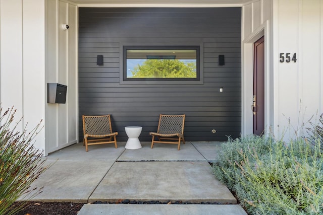 entrance to property with a patio