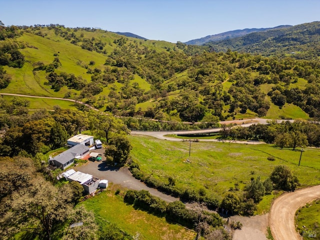 bird's eye view featuring a mountain view and a rural view