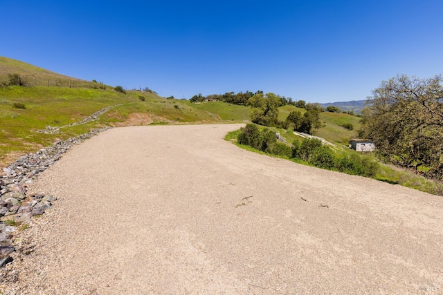 view of road featuring a rural view