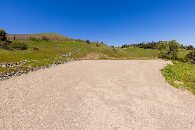 view of road featuring a rural view