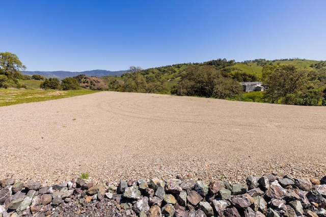 exterior space featuring a mountain view