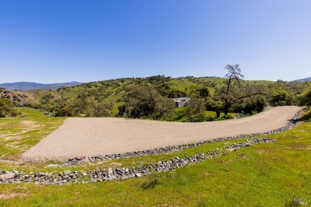 surrounding community featuring a mountain view