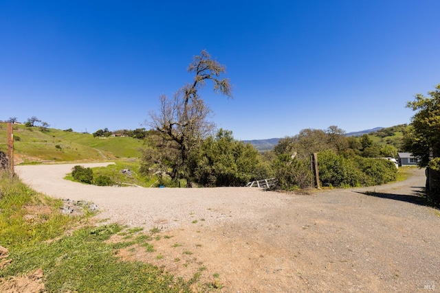 exterior space featuring a mountain view