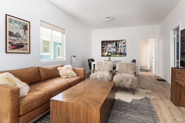 living room featuring light hardwood / wood-style flooring