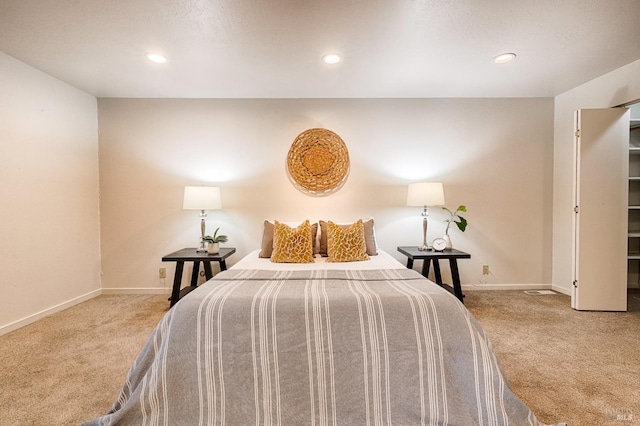 carpeted bedroom with baseboards and recessed lighting