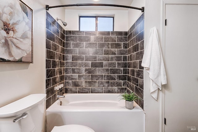 bathroom featuring  shower combination and toilet