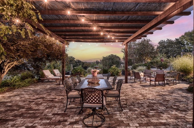 view of patio with outdoor dining area and a pergola