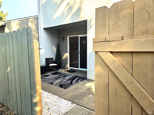 doorway to property featuring a patio area