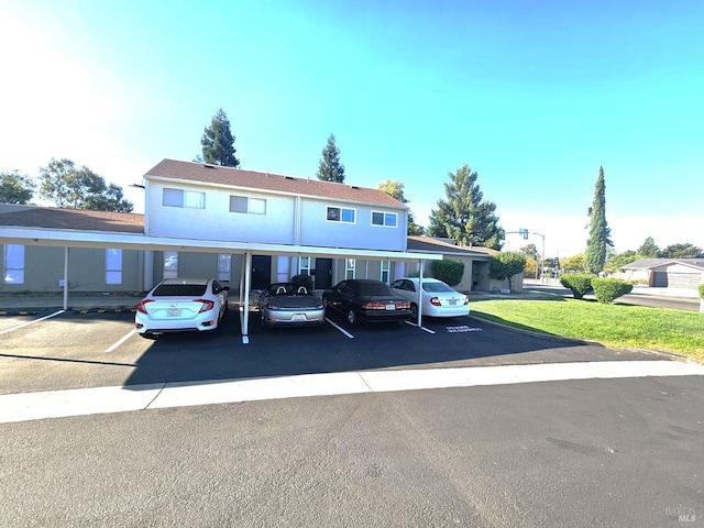 view of front of house with a carport