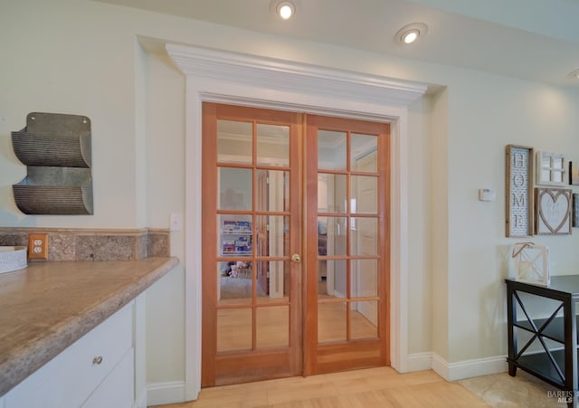 doorway featuring light hardwood / wood-style floors