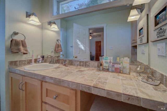 bathroom with vanity and ceiling fan