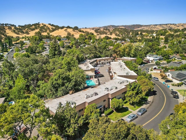 drone / aerial view featuring a mountain view