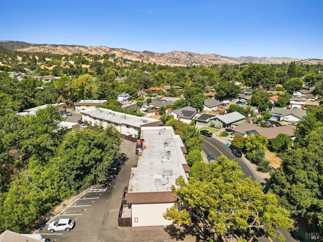 birds eye view of property with a mountain view