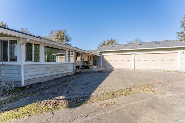 view of front of property featuring a garage