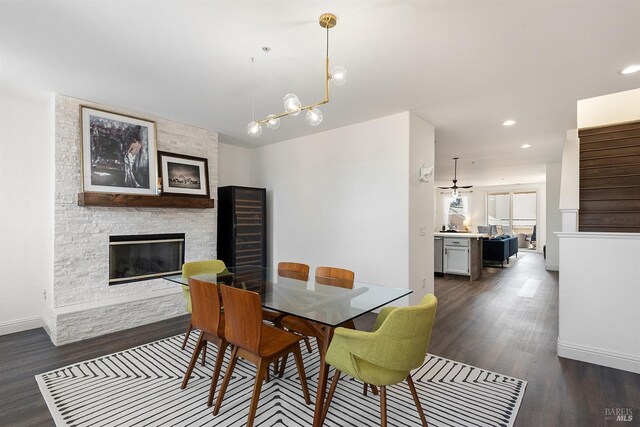 850 Mcclelland Dr, Windsor, CA 95492 - dining area with a fireplace, dark wood-style flooring, baseboards, and recessed lighting