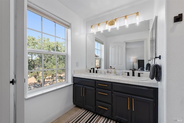 850 Mcclelland Dr, Windsor, CA 95492 - full bathroom with double vanity, baseboards, and tile patterned flooring