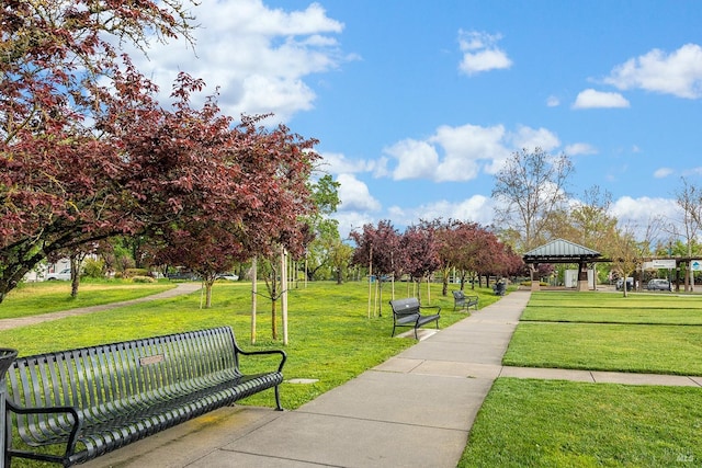 view of community featuring a yard and a gazebo