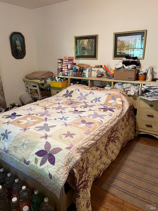 bedroom featuring wood-type flooring