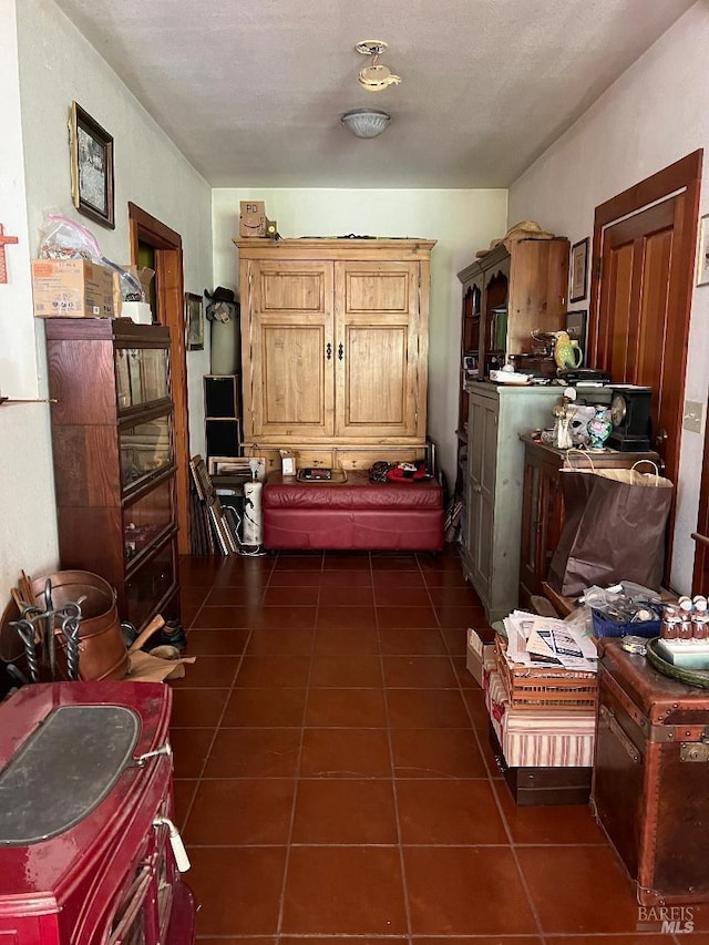 interior space with dark tile patterned floors