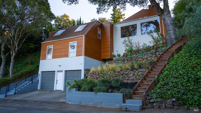 view of front of property with a garage