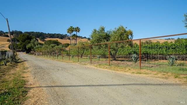 view of road featuring a rural view